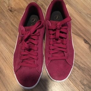 Burgundy pumas